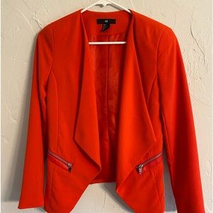 Reddish orange blazer